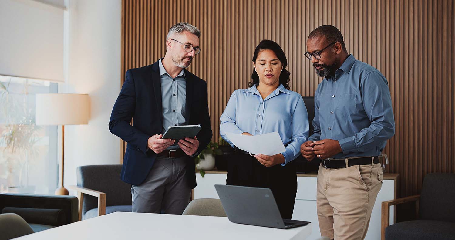 Finance colleagues discussing strategy,