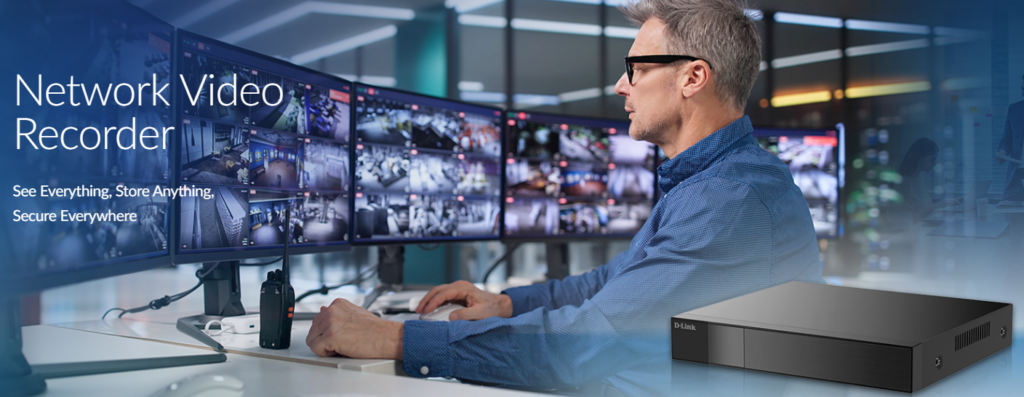 D-Link network video recorder beside a member of staff monitoring camera feeds